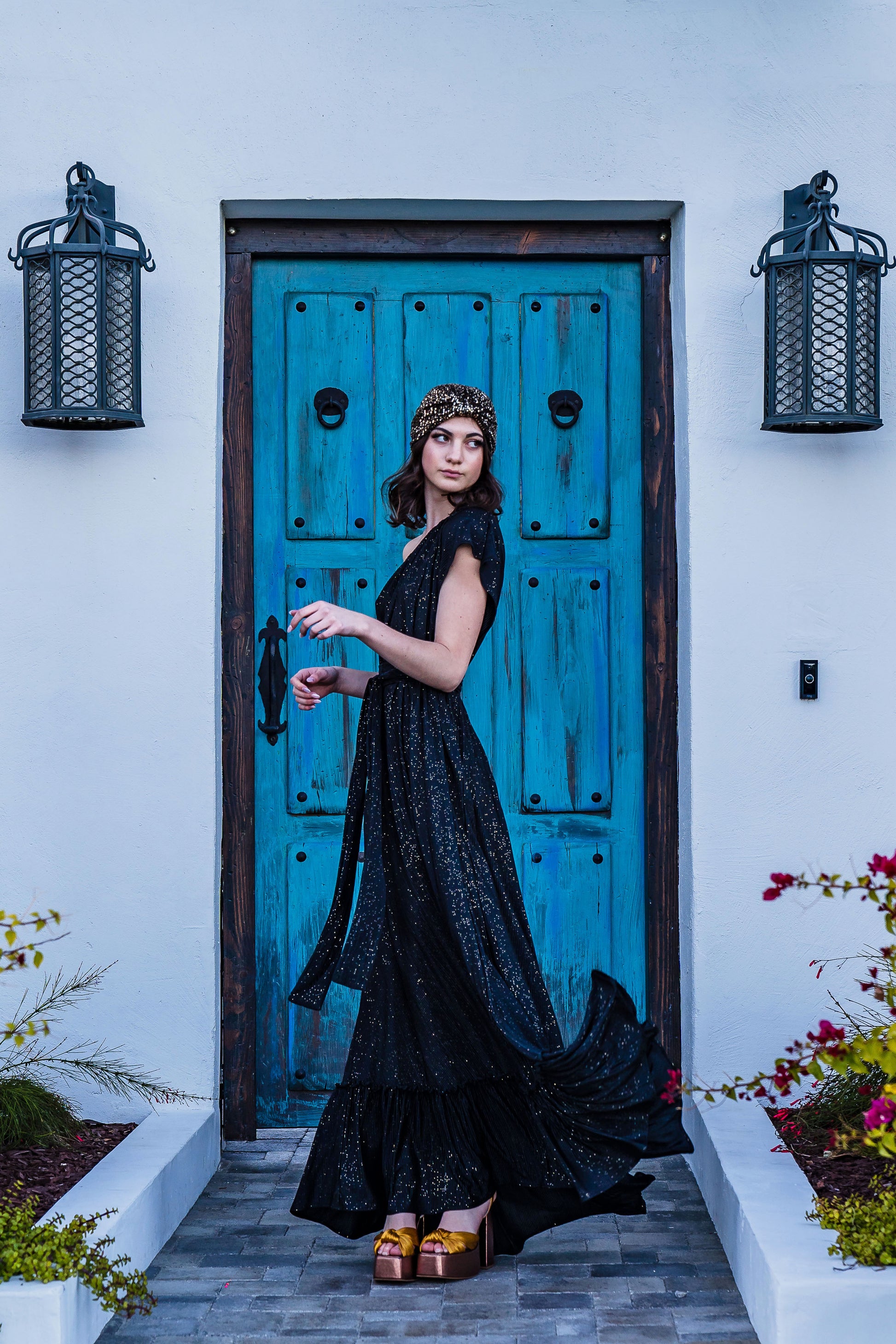 This one shoulder maxi dress was made with luxurious pleated glittery fabric.