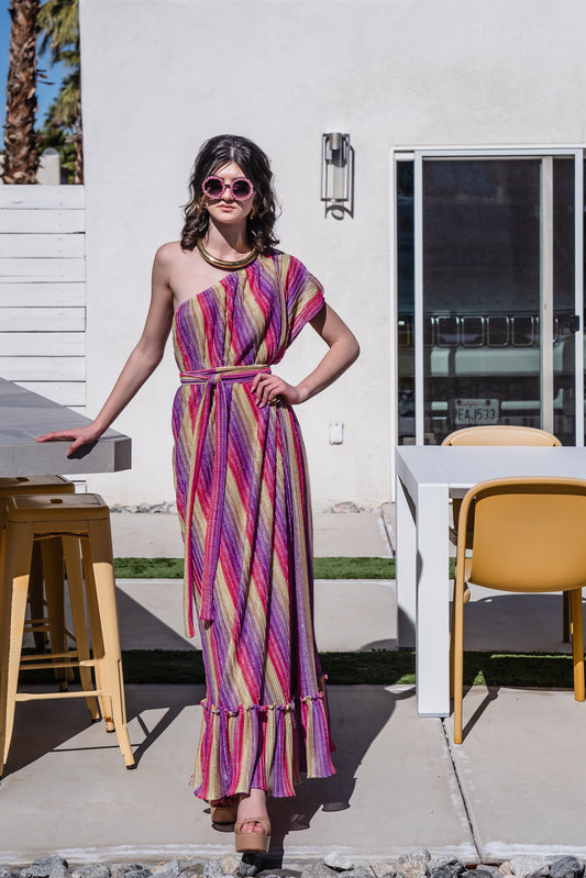 This Rainbow Prism Pleated Party One Shoulder Maxi Dress showcases a unique rainbow prism design that will have you shining at any party or event.