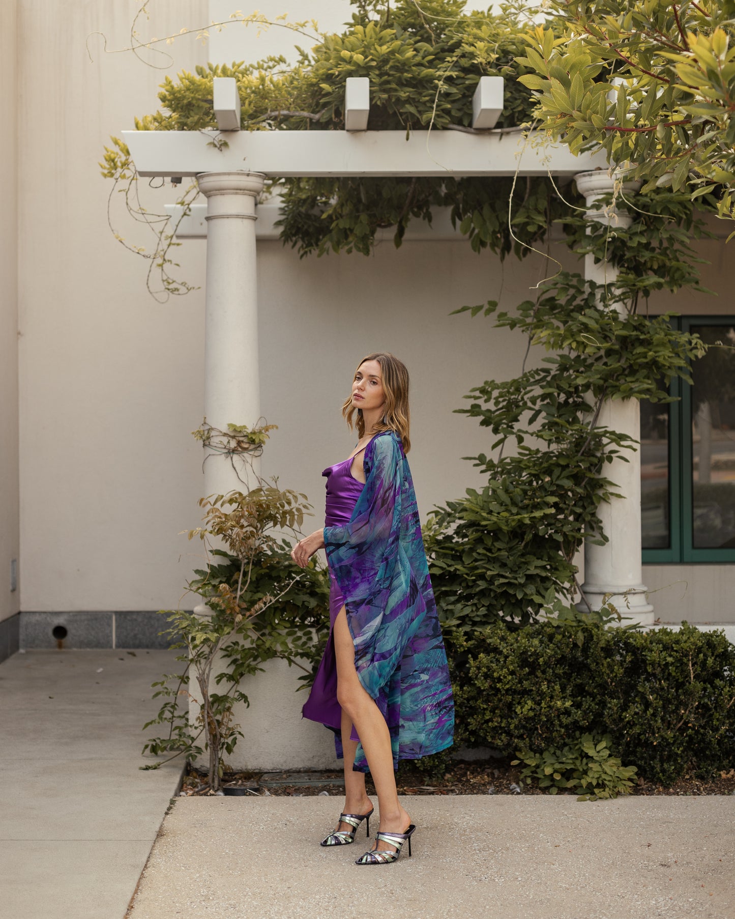 Vibrant purple teal abstract kimono robe with belt. Made from silk chiffon, this kimono exudes sultry elegance. It can be worn open as a robe or wrap dress. Long flowy sleeves with ankle hem.