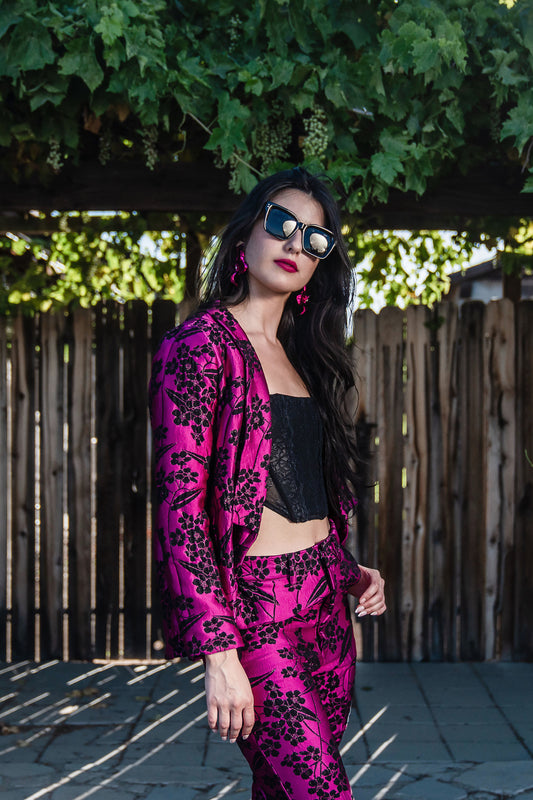 This blazer is made from a soft jacquard fabric with luscious woven flowers: featuring a shawl collar and pockets in each garment