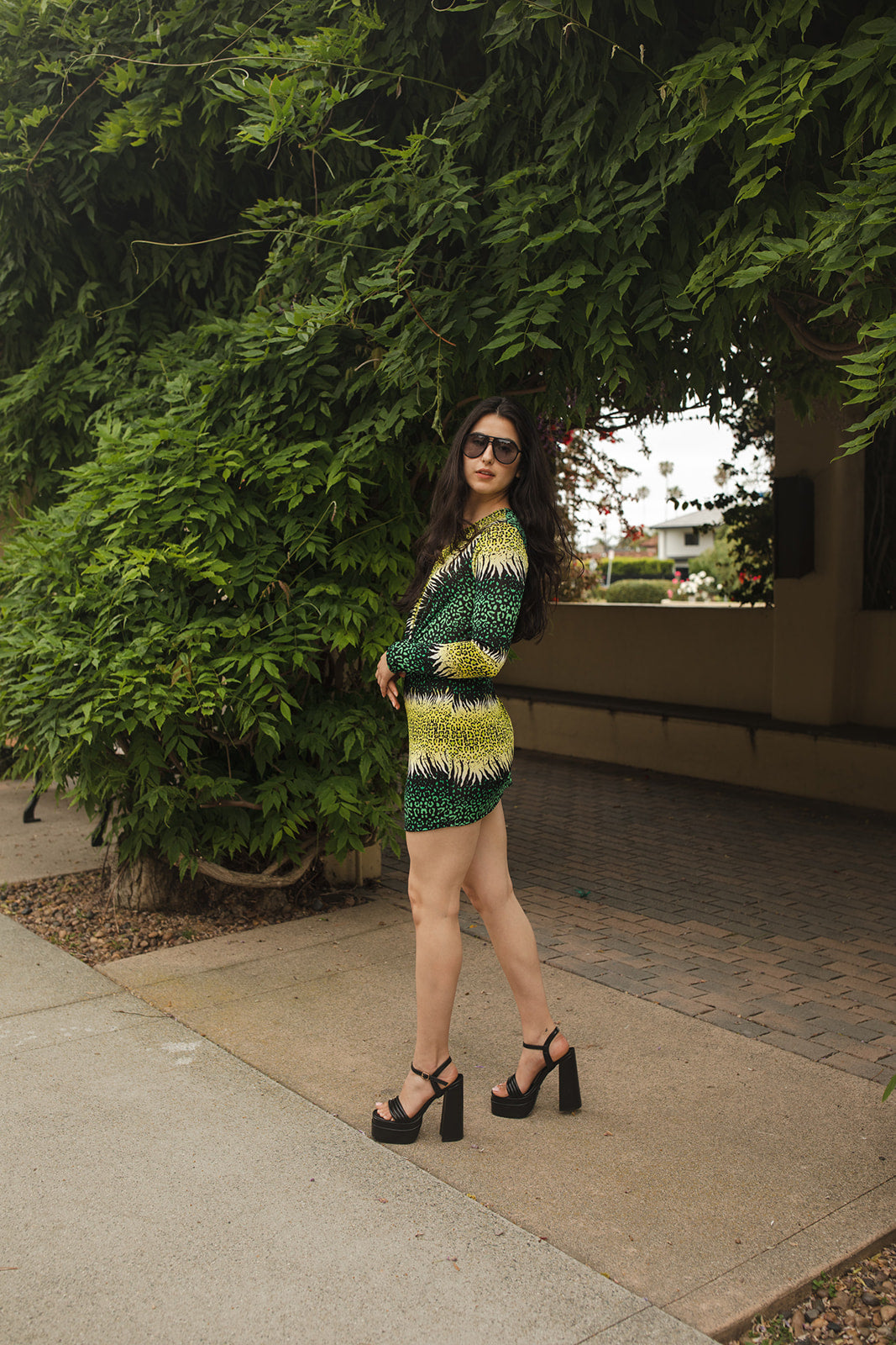jennafer grace Reptilia Mini Twist Dress emerald shamrock green and neon lime yellow green with white black abstract reptilian leopard print long sleeve bodycon mini dress with twist front and thumbholes at cuff boho bohemian hippie romantic whimsical handmade in California USA
