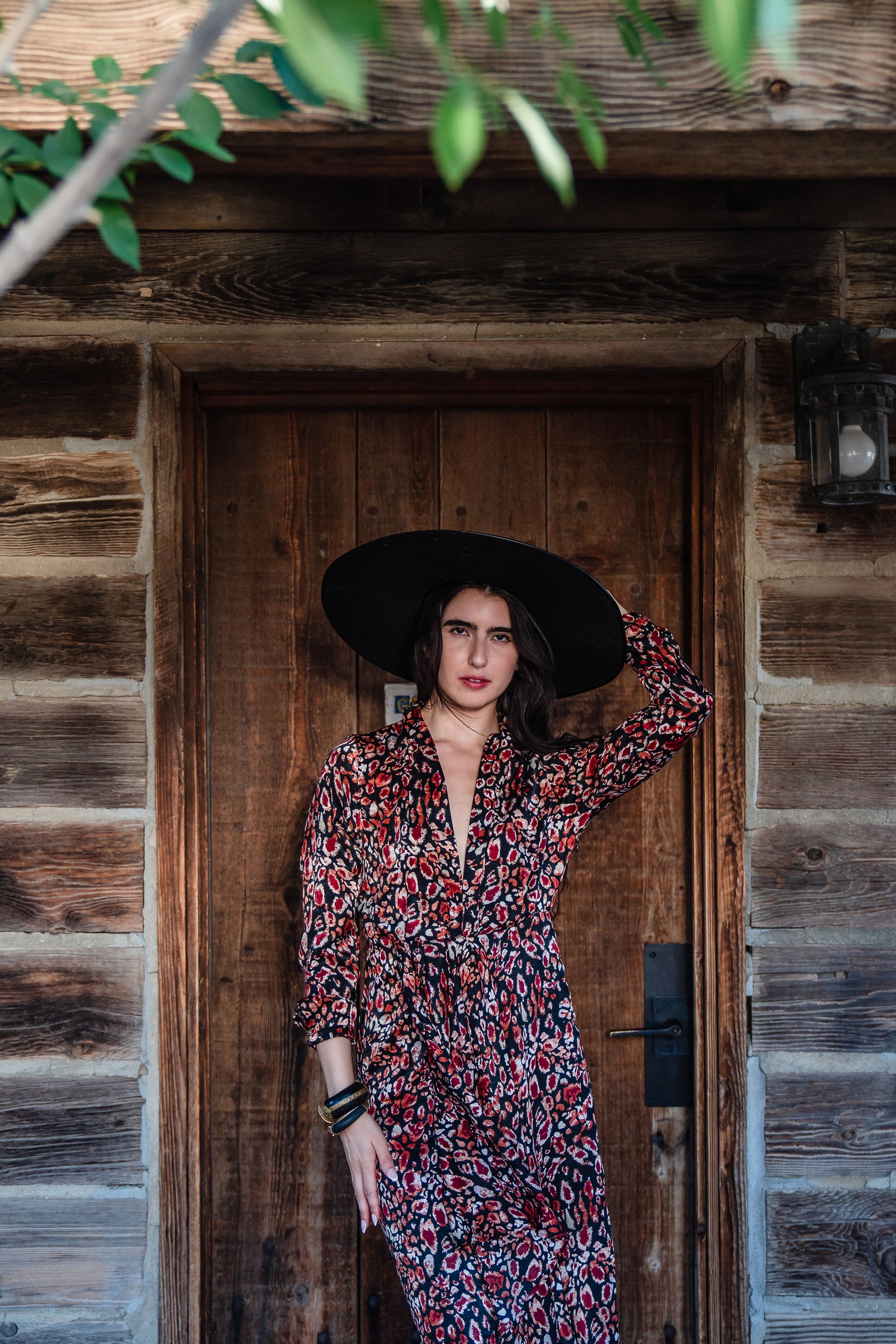 This shawl collar, leopard print, boho maxi dress is our favorite silhouette. Featuring a soft cross ruffle skirt, button sleeve and invisible zipper at side, this piece is perfect for desk to dinner styling. 