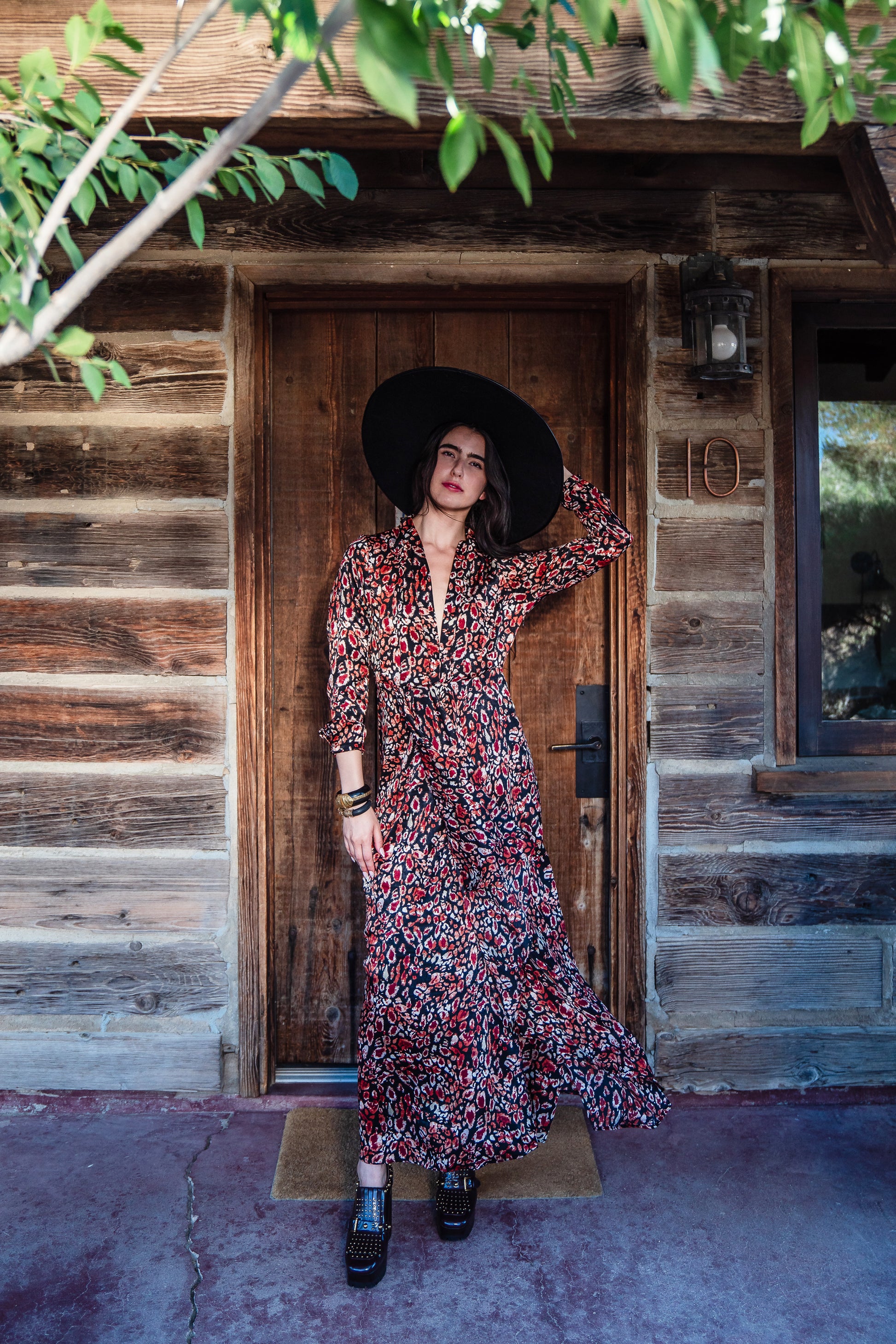 This shawl collar, leopard print, boho maxi dress is our favorite silhouette. Featuring a soft cross ruffle skirt, button sleeve and invisible zipper at side, this piece is perfect for desk to dinner styling. 