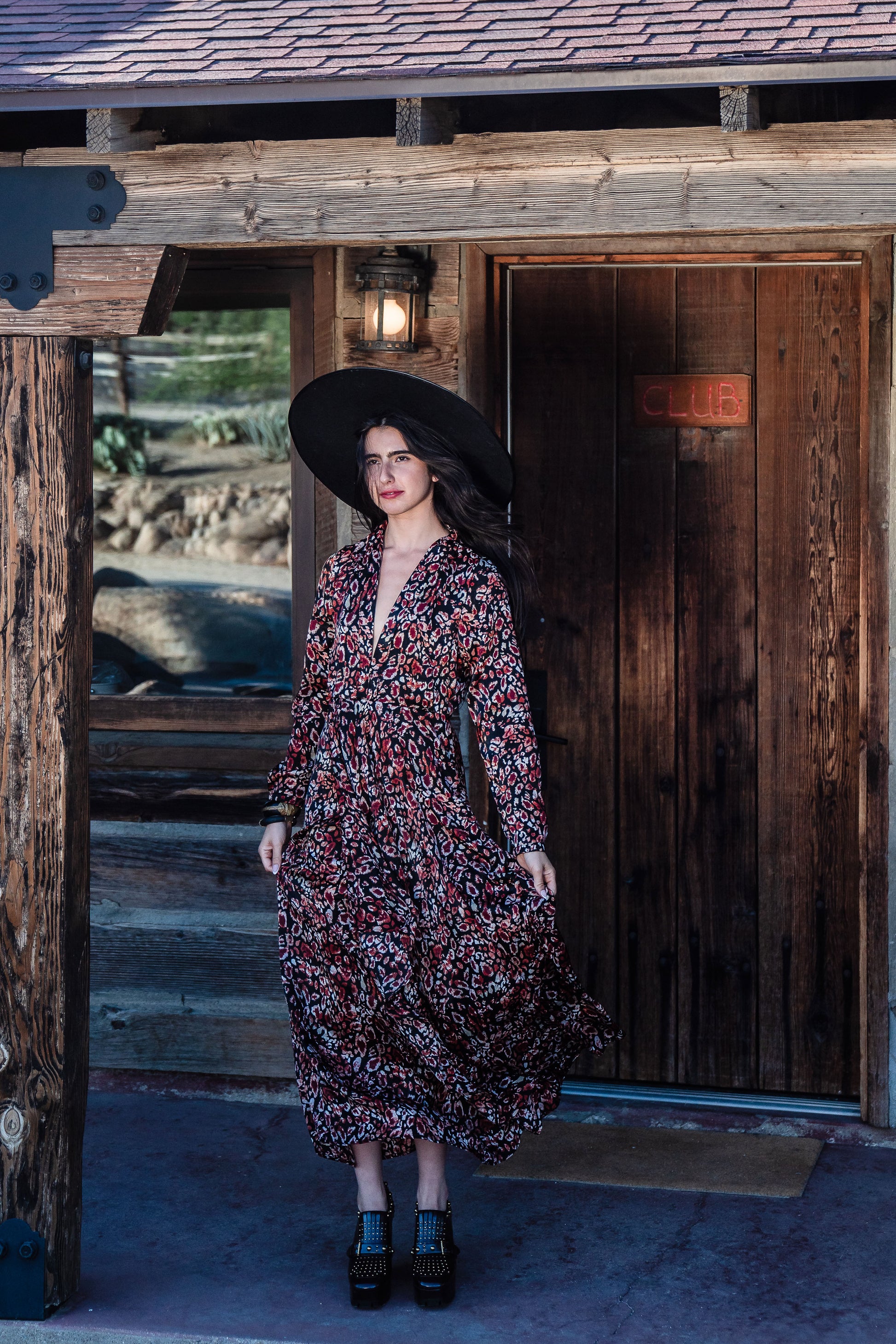 This shawl collar, leopard print, boho maxi dress is our favorite silhouette. Featuring a soft cross ruffle skirt, button sleeve and invisible zipper at side, this piece is perfect for desk to dinner styling. 