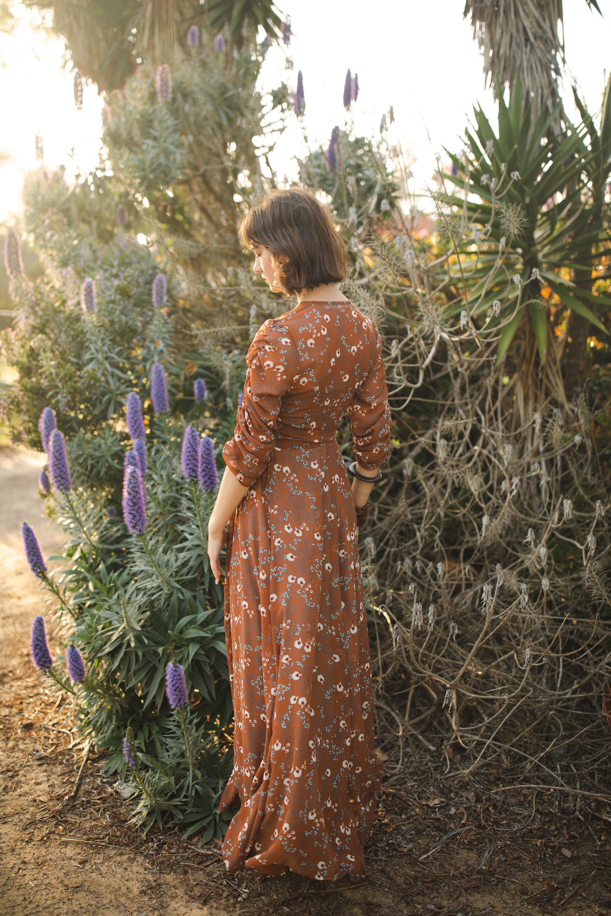 jennafer grace Signature Wrap Dress in Terracotta rustic terracotta orange red maxi dress with pastel floral flower print with long waist tie and ruched sleeves boho bohemian hippie romantic whimsical spring gown wedding guest dress unisex handmade