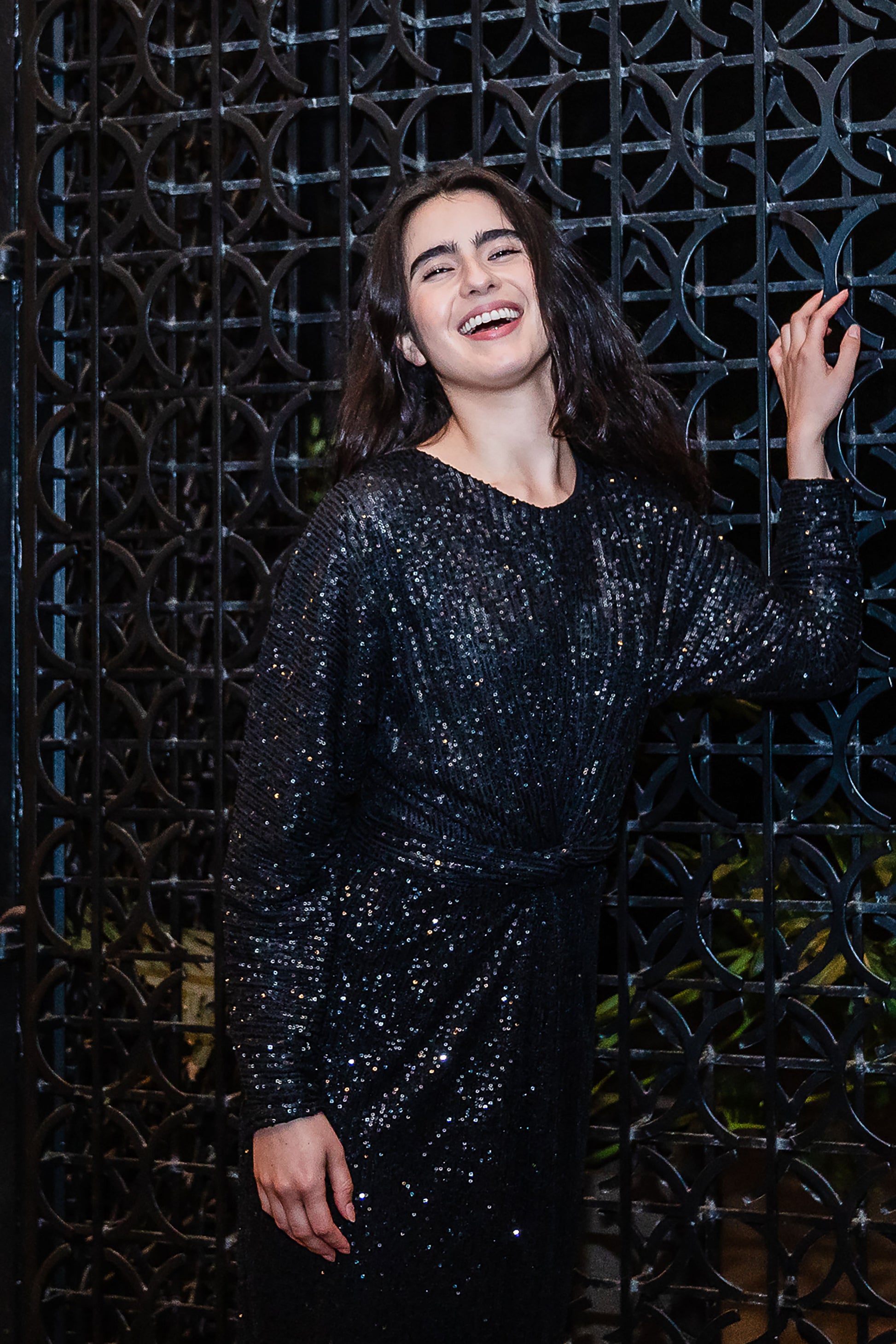 This Old-Hollywood inspired sequin dress is peak glamour. Featuring a versatile extra long waist tie and luscious, eye catching twist style at front.